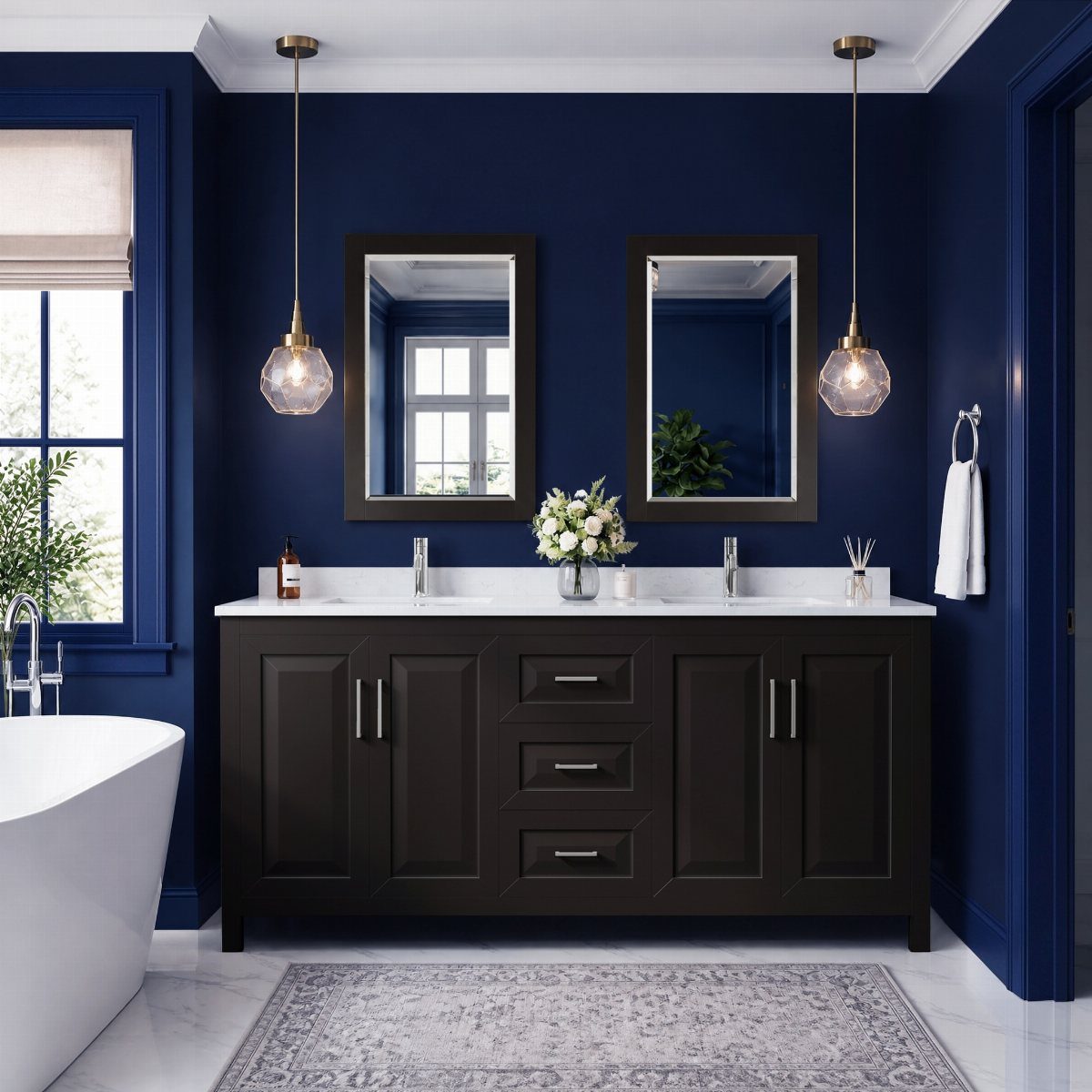 Dark bathroom cabinets paired with a bright white countertop against navy blue walls.