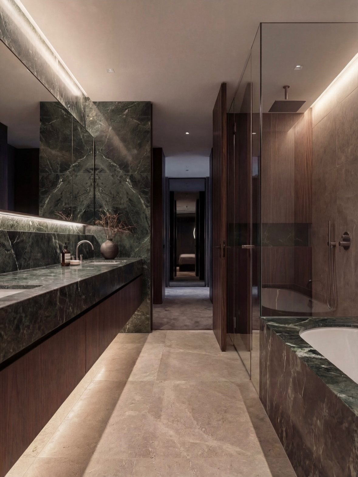 Dark green marble countertops and backsplash in a modern bathroom with wood cabinetry.